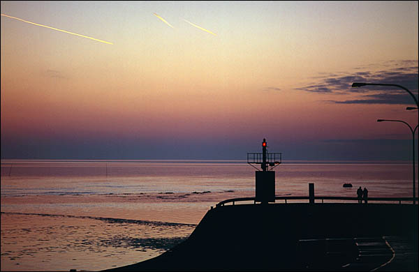 Sonnenuntergang am Eidersperrwerk, © 2006 Juergen Kullmann